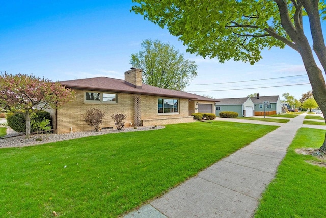 1020 W 3rd St, Kimberly, WI 54136 - ranch-style home featuring a garage, concrete driveway, brick siding, and a front lawn