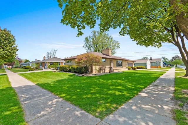 1020 W 3rd St, Kimberly, WI 54136 - single story home featuring a front yard, a chimney, and a garage