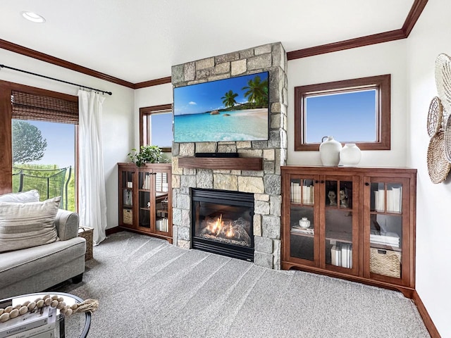 5634 Wind Dancer Ct, Sheboygan, WI 53081 - living room featuring carpet, a fireplace, baseboards, and ornamental molding