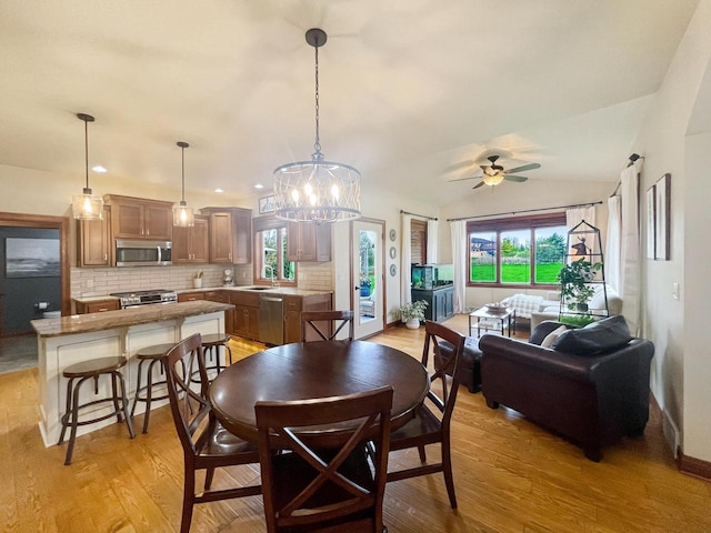 5634 Wind Dancer Ct, Sheboygan, WI 53081 - dining area featuring plenty of natural light, light wood finished floors, and ceiling fan