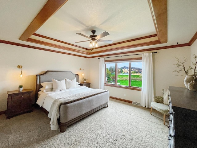 5634 Wind Dancer Ct, Sheboygan, WI 53081 - bedroom featuring a tray ceiling, ornamental molding, light colored carpet, a ceiling fan, and baseboards