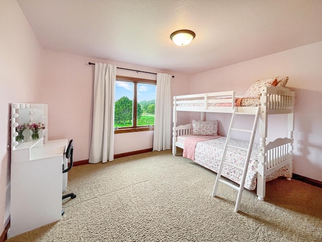 5634 Wind Dancer Ct, Sheboygan, WI 53081 - bedroom with light colored carpet, baseboards, and an office area