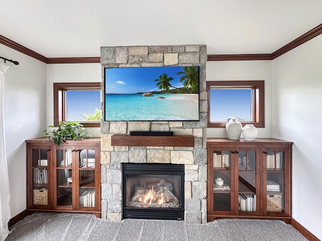 5634 Wind Dancer Ct, Sheboygan, WI 53081 - carpeted living area with baseboards, ornamental molding, and a fireplace