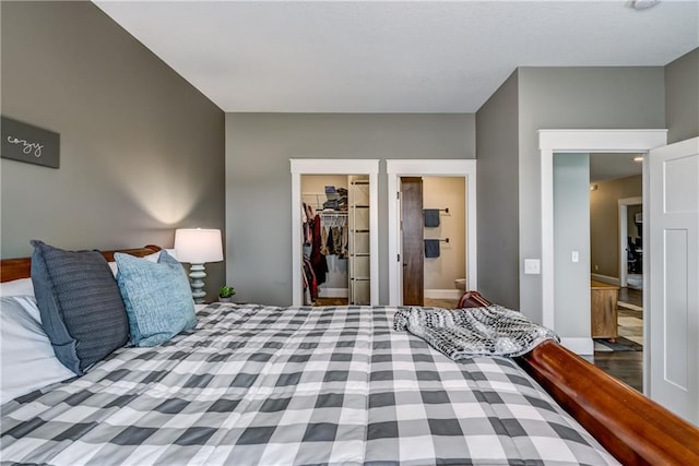 1215 Brooke Ct, Chippewa Falls, WI 54729 - bedroom with a spacious closet, a closet, and ensuite bathroom
