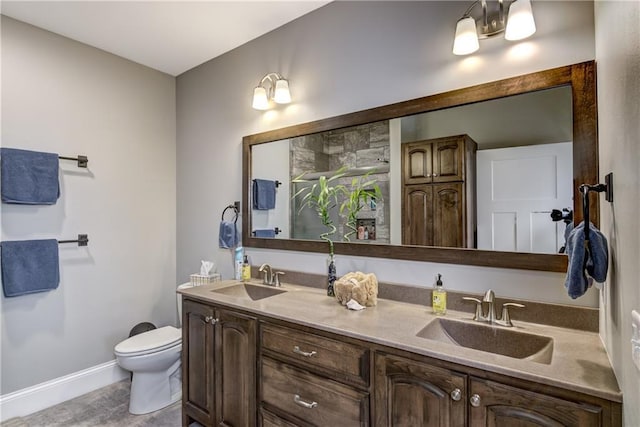 1215 Brooke Ct, Chippewa Falls, WI 54729 - full bath featuring toilet, double vanity, and baseboards