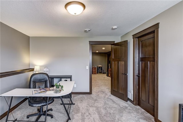 1215 Brooke Ct, Chippewa Falls, WI 54729 - office space featuring light carpet, a textured ceiling, and baseboards