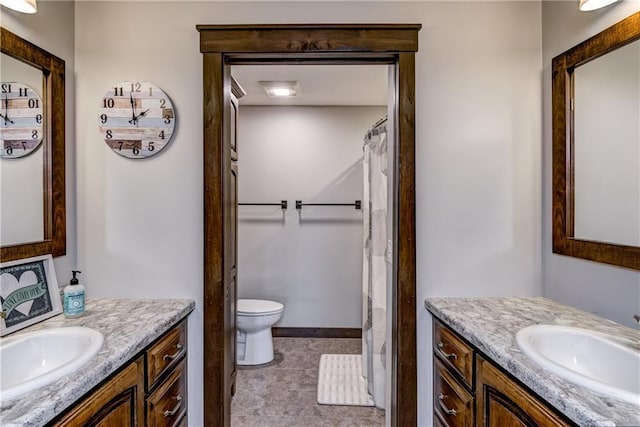 1215 Brooke Ct, Chippewa Falls, WI 54729 - full bath with two vanities and toilet