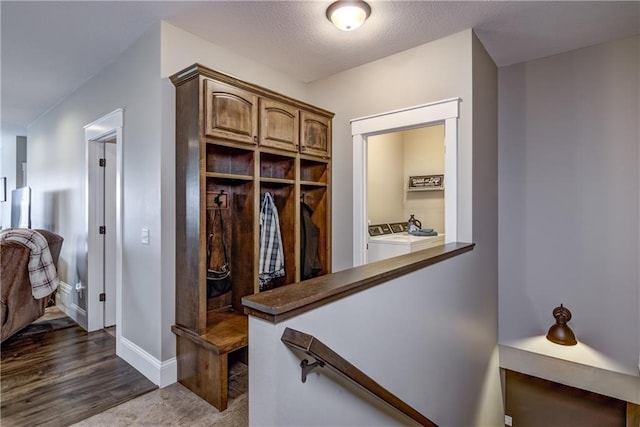 1215 Brooke Ct, Chippewa Falls, WI 54729 - mudroom with washing machine and clothes dryer and baseboards