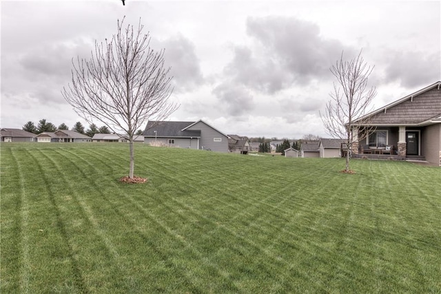 1215 Brooke Ct, Chippewa Falls, WI 54729 - view of green lawn with a residential view
