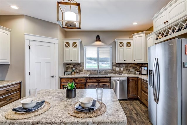 1215 Brooke Ct, Chippewa Falls, WI 54729 - kitchen featuring appliances with stainless steel finishes, white cabinetry, a sink, and recessed lighting