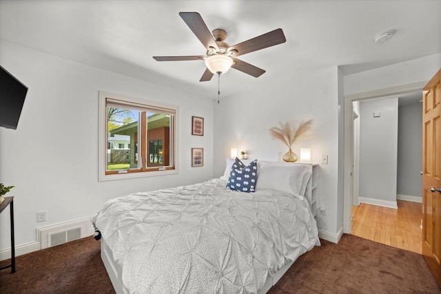 530 W Acacia Rd, Glendale, WI 53217 - carpeted bedroom featuring baseboards and ceiling fan