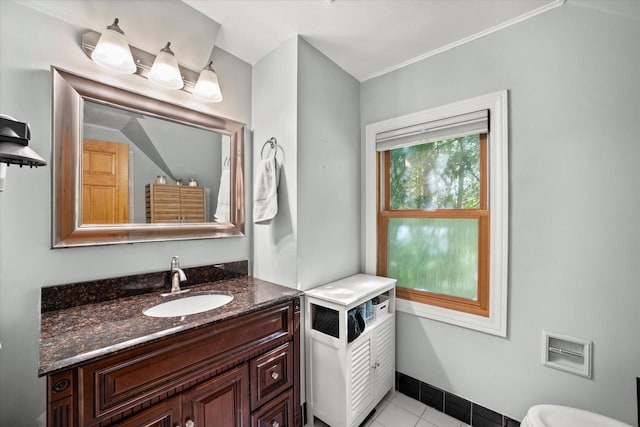 530 W Acacia Rd, Glendale, WI 53217 - bathroom with tile patterned floors, vanity, toilet, and baseboards