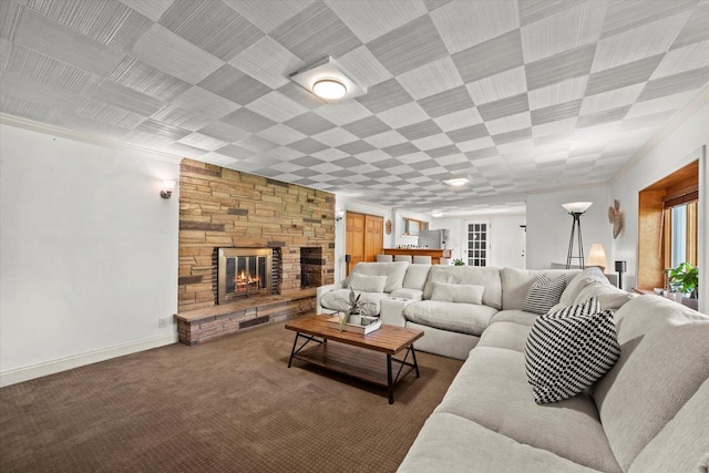 530 W Acacia Rd, Glendale, WI 53217 - carpeted living room with a stone fireplace and baseboards