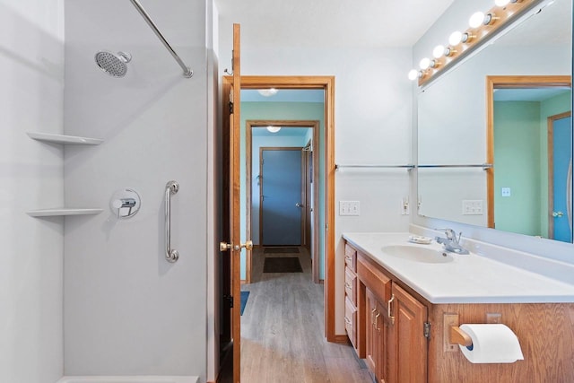 N3351 County Road B, Kewaunee, WI 54216 - full bathroom with wood finished floors, a shower, and vanity