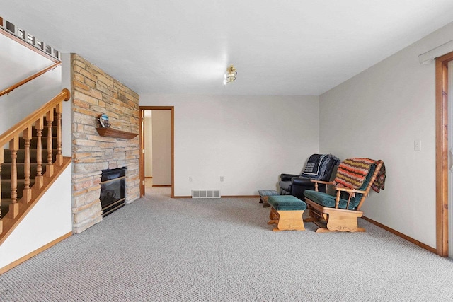 N3351 County Road B, Kewaunee, WI 54216 - unfurnished room featuring carpet floors, baseboards, a fireplace, and stairs