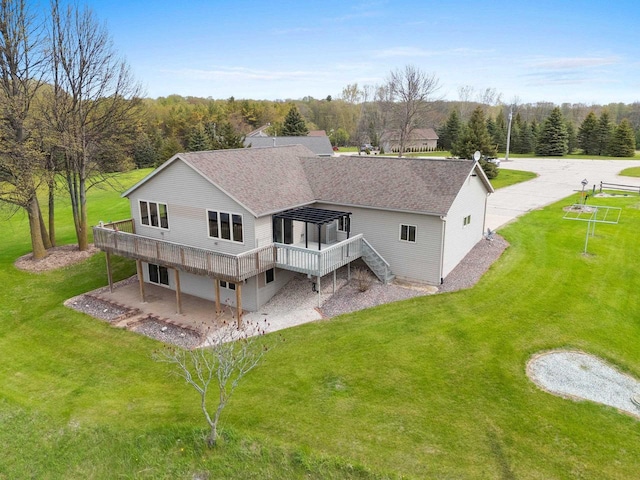 N3351 County Road B, Kewaunee, WI 54216 - back of house featuring a wooden deck, stairway, a patio, and roof with shingles