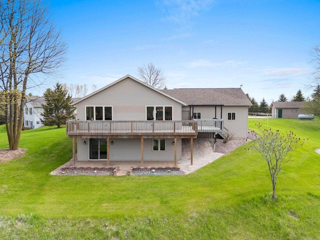 N3351 County Road B, Kewaunee, WI 54216 - back of property featuring a deck, a patio, and a yard