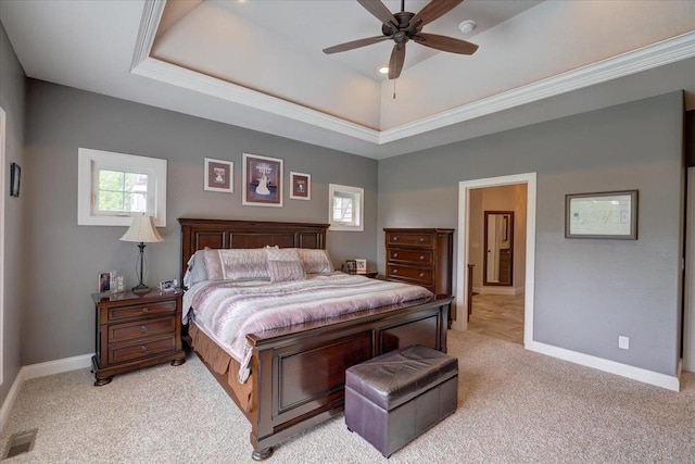 1002 Millies Way, Waunakee, WI 53597 - bedroom featuring light carpet, multiple windows, a tray ceiling, baseboards, and crown molding