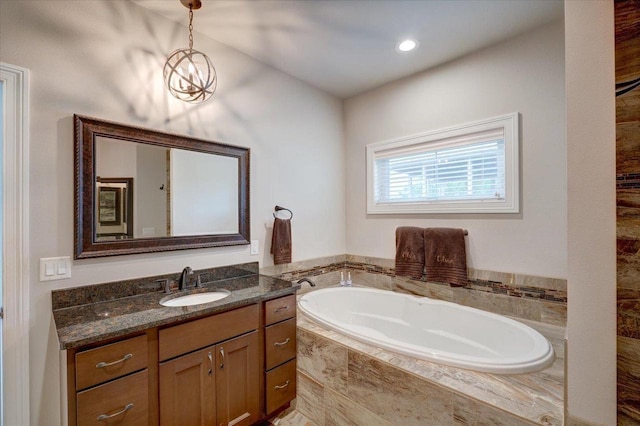 1002 Millies Way, Waunakee, WI 53597 - full bath featuring vanity, a bath, and recessed lighting