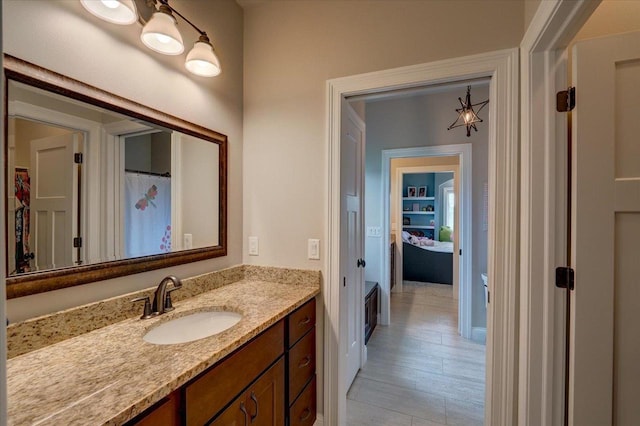 1002 Millies Way, Waunakee, WI 53597 - bathroom featuring vanity and baseboards