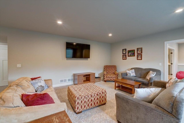 1002 Millies Way, Waunakee, WI 53597 - living area featuring light colored carpet, recessed lighting, and baseboards