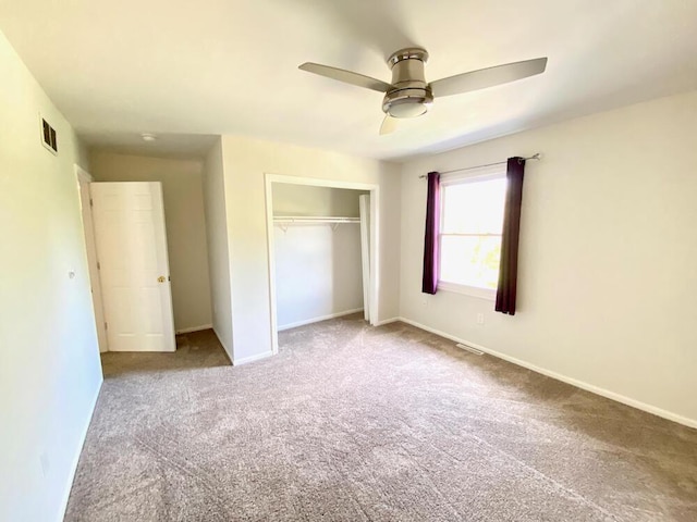 194 Vernon St, Williams Bay, WI 53191 - unfurnished bedroom with a closet, carpet, baseboards, and ceiling fan