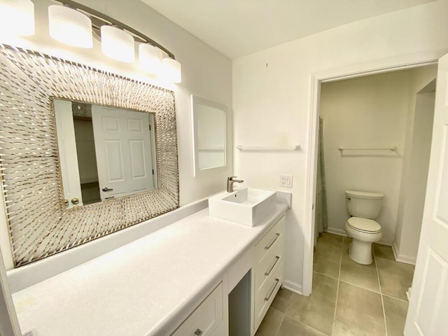 194 Vernon St, Williams Bay, WI 53191 - full bath with tile patterned floors, baseboards, vanity, and toilet