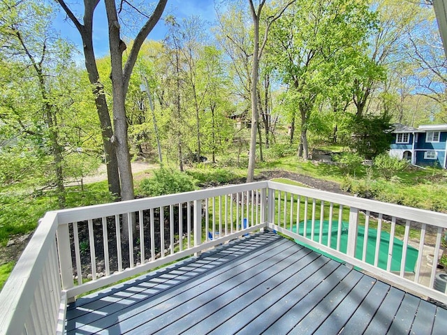 194 Vernon St, Williams Bay, WI 53191 - wooden deck featuring a pool