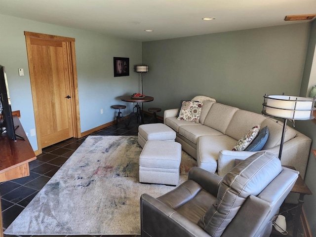 W7429 Akron Dr, Wild Rose, WI 54984 - living area with dark tile patterned floors, recessed lighting, and baseboards