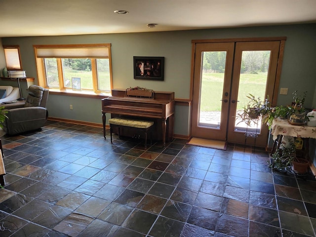 W7429 Akron Dr, Wild Rose, WI 54984 - doorway to outside featuring baseboards, french doors, recessed lighting, and stone tile floors
