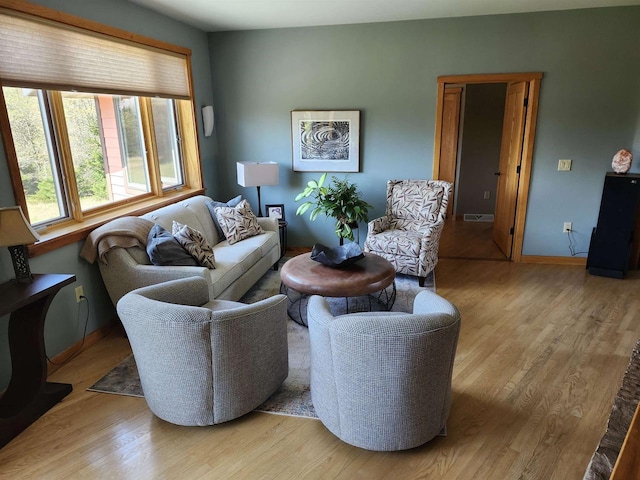 W7429 Akron Dr, Wild Rose, WI 54984 - living area with wood finished floors and baseboards
