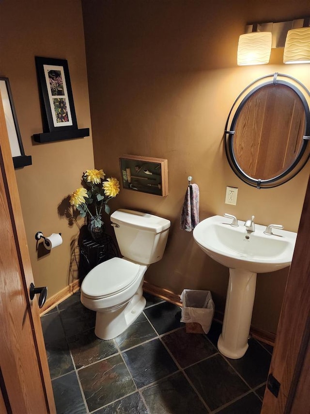 W7429 Akron Dr, Wild Rose, WI 54984 - bathroom with toilet and baseboards