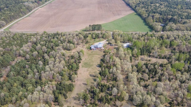 W7429 Akron Dr, Wild Rose, WI 54984 - aerial overview of property's location with rural landscape and a heavily wooded area
