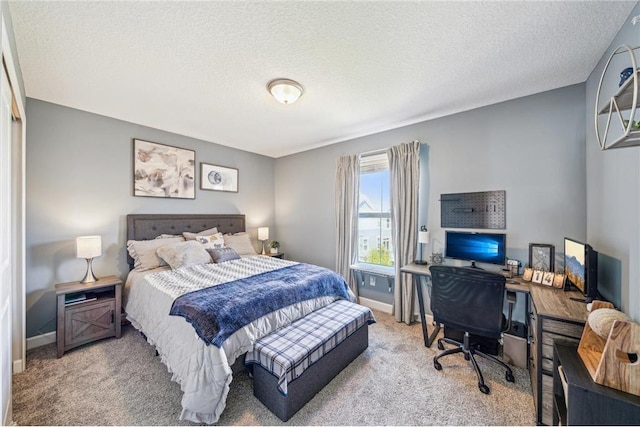 4271 Corn Silk Ln, Saint Paul, MN 55129 - carpeted bedroom featuring baseboards, an office area, and a textured ceiling