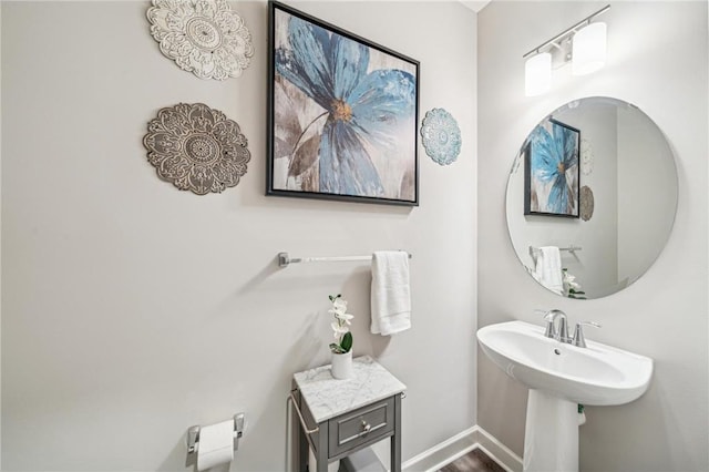 4271 Corn Silk Ln, Saint Paul, MN 55129 - bathroom with baseboards and wood finished floors