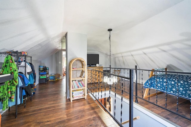 129 W 19th Ave, Oshkosh, WI 54902 - additional living space featuring wood finished floors and lofted ceiling