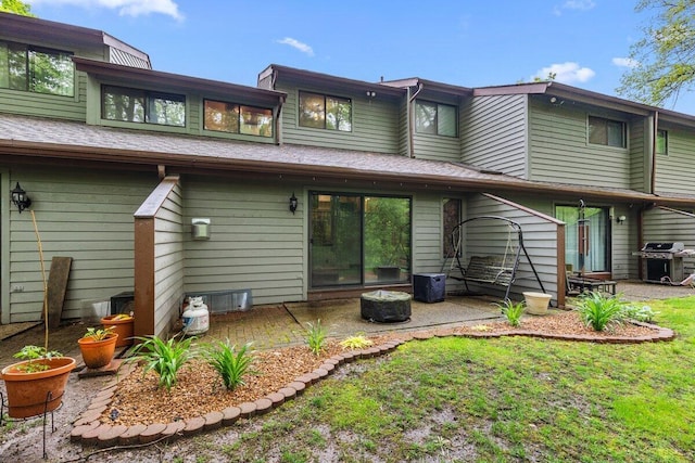 2734 Old Mill Dr Unit A-2, Racine, WI 53405 - back of house with a patio area