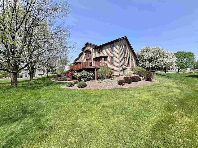 86 Ledgebrook Dr, Fond Du Lac, WI 54935 - rear view of property with a deck and a lawn