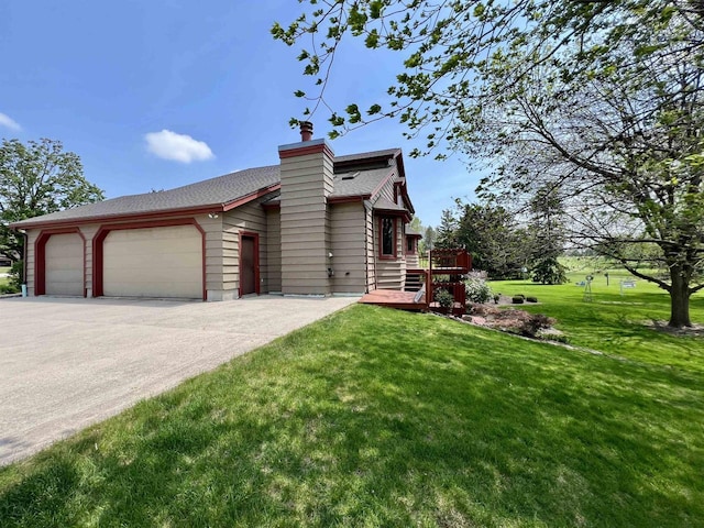 86 Ledgebrook Dr, Fond Du Lac, WI 54935 - view of front of property featuring a front yard, an attached garage, a shingled roof, a wooden deck, and a chimney