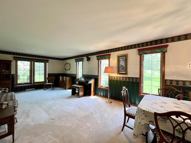 86 Ledgebrook Dr, Fond Du Lac, WI 54935 - carpeted living room with a wainscoted wall and plenty of natural light