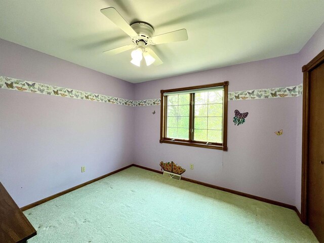 86 Ledgebrook Dr, Fond Du Lac, WI 54935 - carpeted empty room with a ceiling fan and baseboards