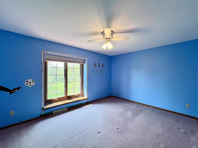 86 Ledgebrook Dr, Fond Du Lac, WI 54935 - empty room featuring carpet, baseboards, and a ceiling fan