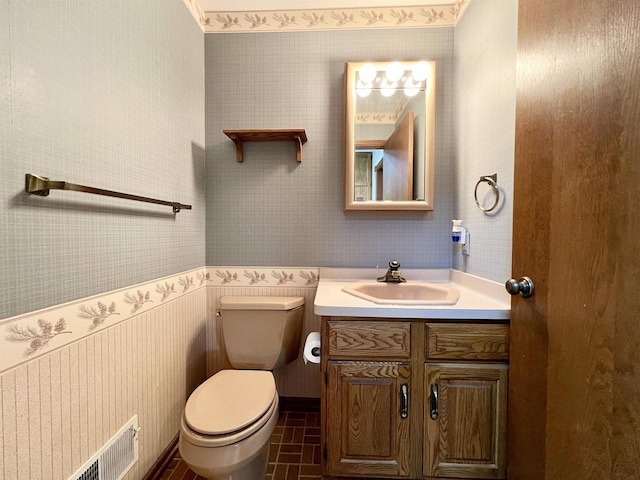 86 Ledgebrook Dr, Fond Du Lac, WI 54935 - half bath with wallpapered walls, brick patterned floors, toilet, and vanity