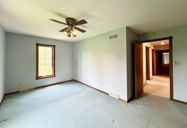 86 Ledgebrook Dr, Fond Du Lac, WI 54935 - unfurnished room with ceiling fan, light carpet, and baseboards