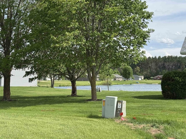 804 NW Cumberland St, Berlin, WI 54923 - view of property's community featuring a water view and a lawn