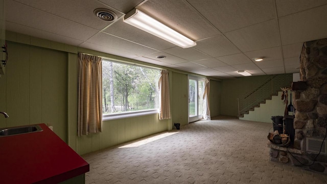 N2757 Shadow Rd, Waupaca, WI 54981 - basement with a sink, stairs, carpet floors, and a paneled ceiling