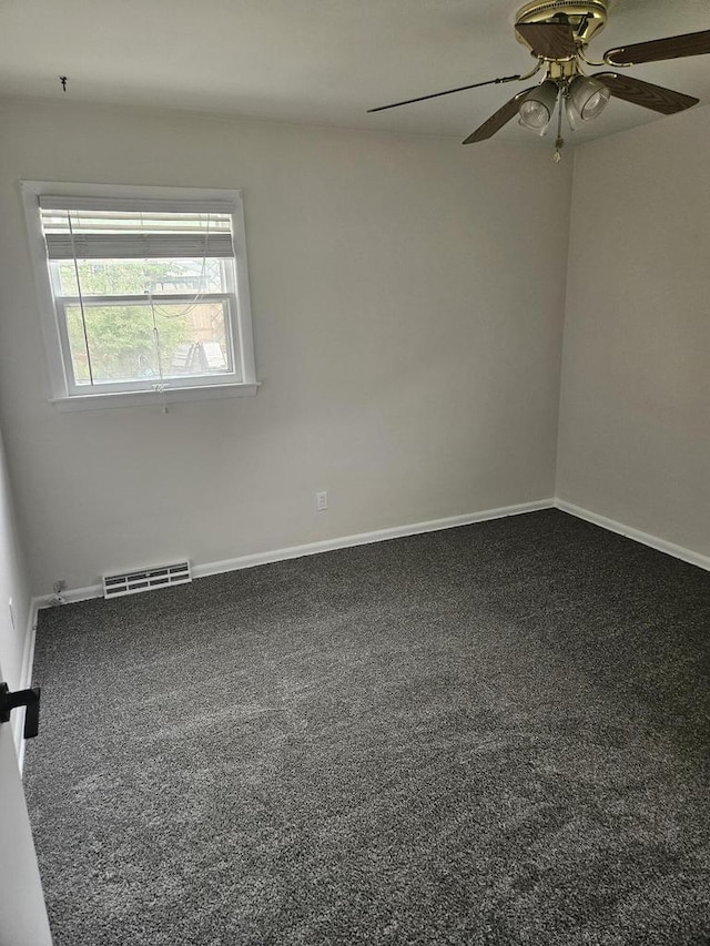 2416 N 69th St Unit 2418, Wauwatosa, WI 53213 - spare room featuring ceiling fan, carpet, and baseboards
