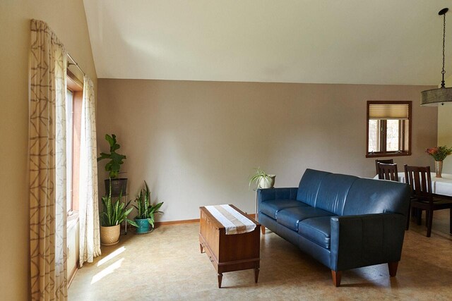 1810 W Upham Ct, Milwaukee, WI 53221 - living area featuring vaulted ceiling and baseboards