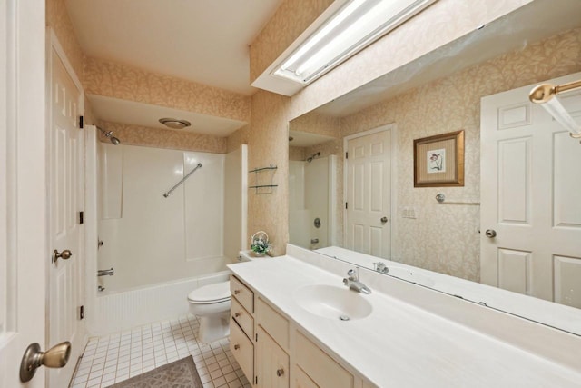 full bath with toilet, tile patterned flooring, vanity, tub / shower combination, and wallpapered walls
