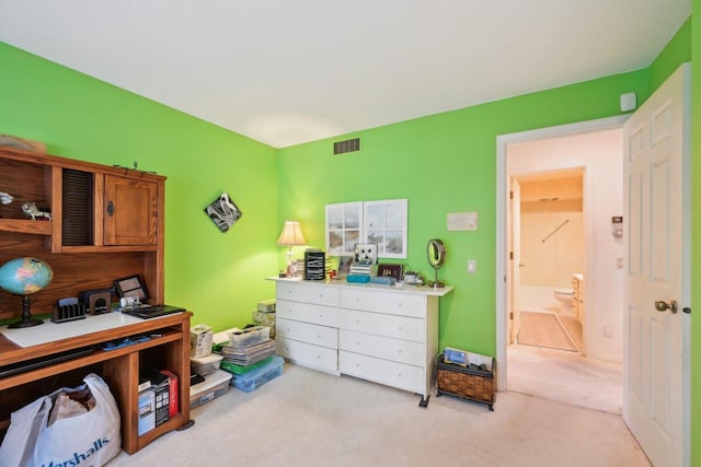 office area featuring light carpet